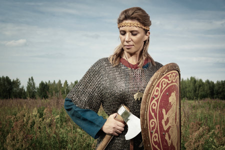 Viking girl warrior with axe in hand fightedの写真素材