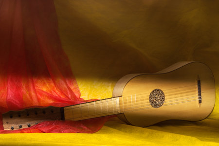 Musical still life with baroque guitar