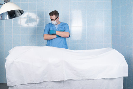 Coroner inspects the body of the crime victim (imitation)の写真素材