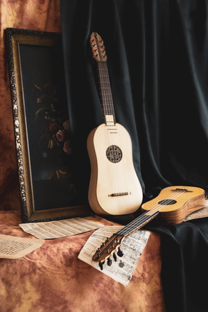 Musical still life in the Renaissance style with two renaissance guitarsの写真素材