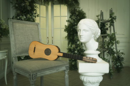 Musical still life in the Renaissance style with renaissance guitarの写真素材