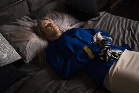 Noir film. Young beautiful flight attendant in uniform being strangled.の写真素材