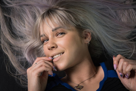 Beautiful young woman in retro styleの写真素材