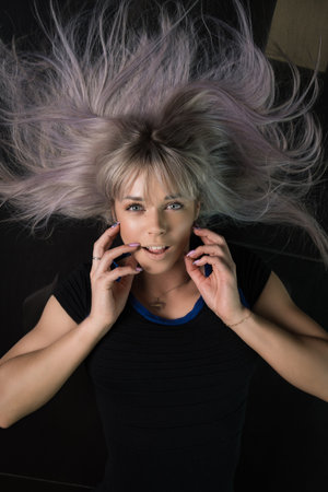 Beautiful young woman in retro styleの写真素材