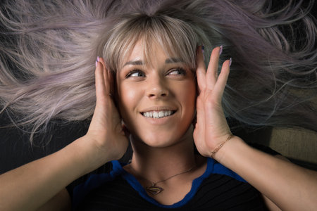 Beautiful young woman in retro styleの写真素材