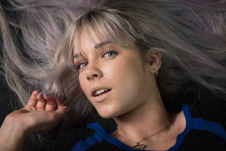 Beautiful young woman in retro styleの写真素材