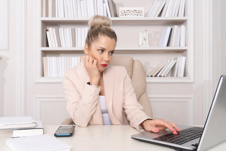 Business woman in the style of Hollywood retro films at the office.の写真素材