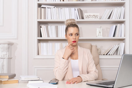 Business woman in the style of Hollywood retro films at the office.の写真素材