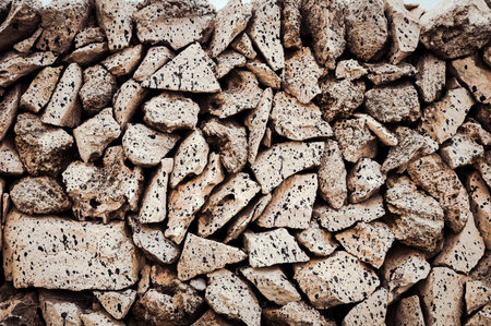 Texture of a stone wall. Old castle stone wall texture background. Stone wall as a background or texture. Part of a stone wall, for background or texture. A typical wall of Menorca island.の写真素材