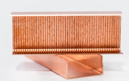 Metal staples of copper for stapler, in insulation with white background. Close up. Macro. selective focusの写真素材