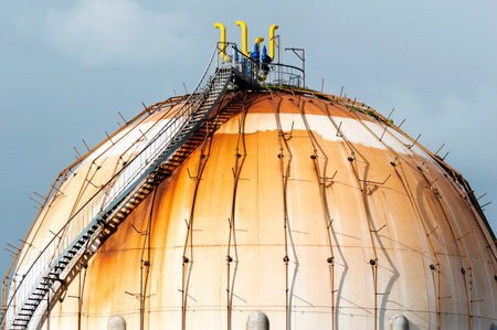 Spherical Natural Gas Tank in the Petrochemical Industry in daylight, Gijon, Asturias, Spain.