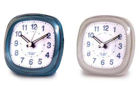 Modern alarm clock multi-colour isolated en white background.