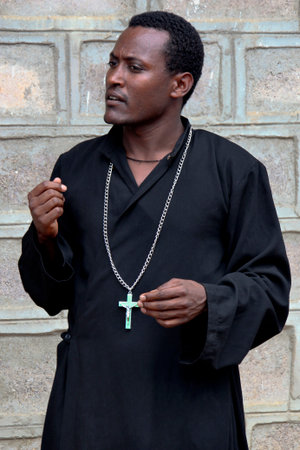 TURMI, ETHIOPIA - NOVEMBER 22, 2011: The priest from the Ethiopian orthodox church. November 22, 2011 in Turmi, Ethiopia.のeditorial素材