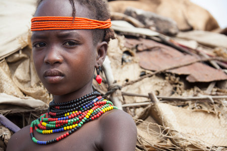 SOUTH OMO - ETHIOPIA - NOVEMBER 23, 2011: Portrait of the unidentified boy from the African tribe Dasanech, in November 23, 2011 in Omo Rift Valley, Ethiopia.のeditorial素材