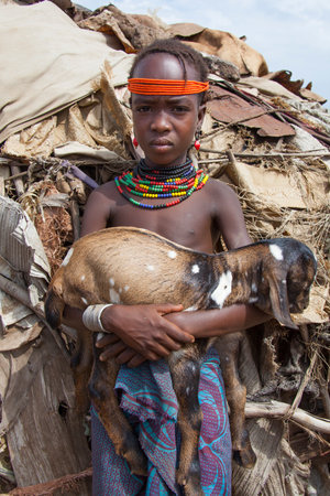 SOUTH OMO - ETHIOPIA - NOVEMBER 23, 2011: Portrait of the unidentified boy from the African tribe Dasanech, in November 23, 2011 in Omo Rift Valley, Ethiopia.のeditorial素材