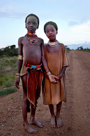 SOUTH OMO - ETHIOPIA - November 23, 2011: Unidentified Hamer girls on November 23, 2014 in South Omo, Ethiopia. The girlss portrait from a tribe a hamer, Ethiopia.のeditorial素材