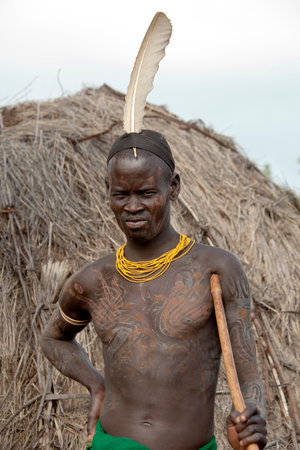 OMO VALLEY, ETHIOPIA - November 20, 2011 - The Mursi are ethnic group that inhabits southwestern...