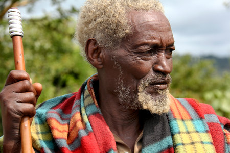 SOUTH OMO - ETHIOPIA - NOVEMBER 26, 2011: Portrait of the unidentified old man from Ethiopia, in November 26, 2011 in Omo Rift Valley, Ethiopia.のeditorial素材