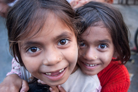 Pokhara, NEPAL - NOVEMBER 03, 2006: Nepalese schoolgirl on the street of the town Pokhara, Nepal.のeditorial素材