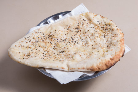 Indian bread filled with cheese, meat or vegetable with garlic.の写真素材