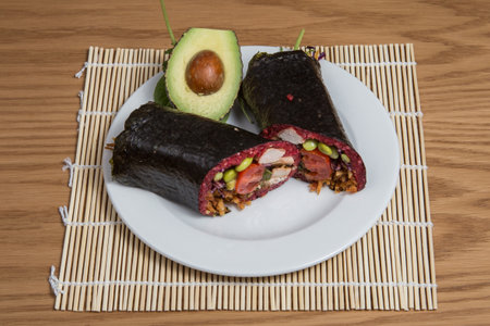 Sushi-Style Wraps with chicken pepperoni, vegetables and nuts.の写真素材