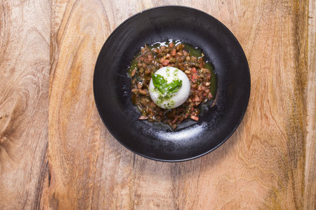 Buffalo burrata cheese served with fresh raw tomatoes.
