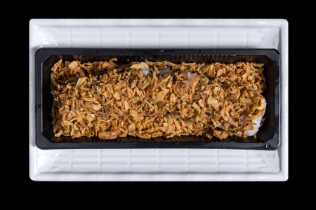 Cali salmon sushi isolated on a black backgroundの写真素材