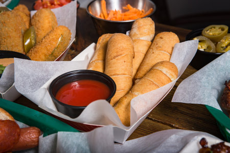Latin-American appetizers called Tequenos made of fried corn filled with cheeseの写真素材