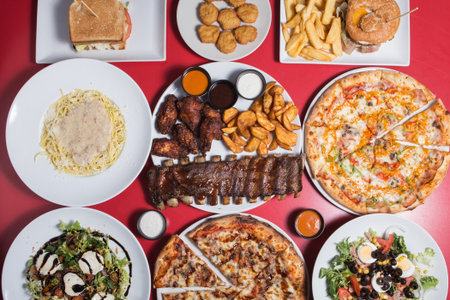 Set of mediterranean food top view, red background