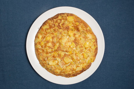 Spanish omelet Tortilla de patata on a white plateの写真素材