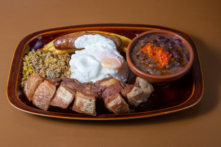 Colombian Bandeja Paisa from above over a restaurante tableの写真素材