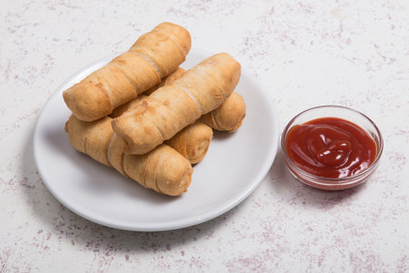 Latin-American appetizers called Tequenos made of fried corn filled with cheese