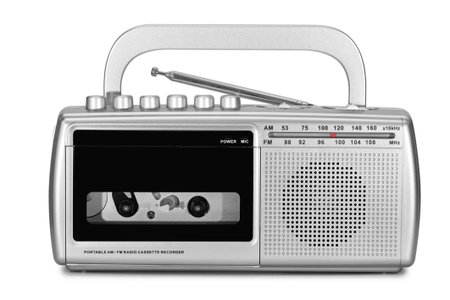 Portable retro radio isolated on white background, devices which are popular in the past for music and newsの写真素材
