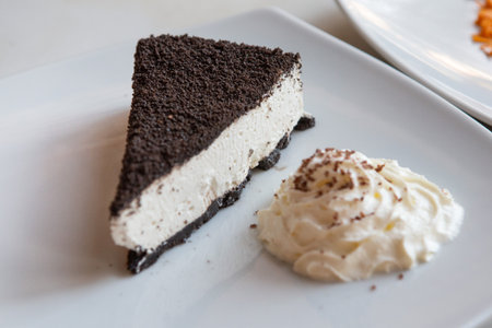 Cheese cake on a white plate in restaurant