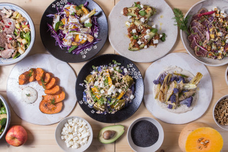 Set of healthy dishes. Quinoa, chickpeas, avocado, fresh vegetables and nutritious food, Halthy eating, dieting food concept on a stone backgroundの写真素材