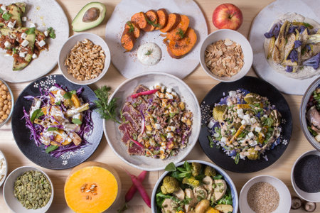 Set of healthy dishes. Quinoa, chickpeas, avocado, fresh vegetables and nutritious food, Halthy eating, dieting food concept on a stone backgroundの写真素材