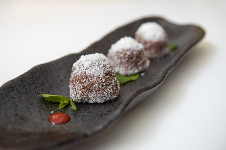 Home made chocolate candies on a plate. Sweet dessert.の写真素材