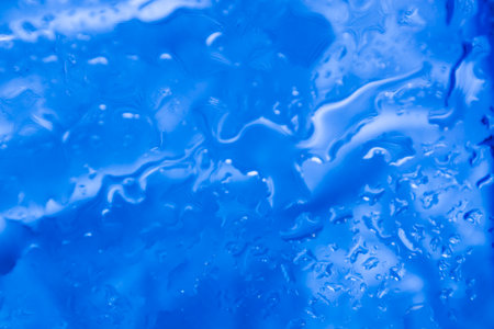 Close up of blue water splashBokeh backgrounds.の写真素材