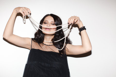 Woman trying the tiaraの写真素材