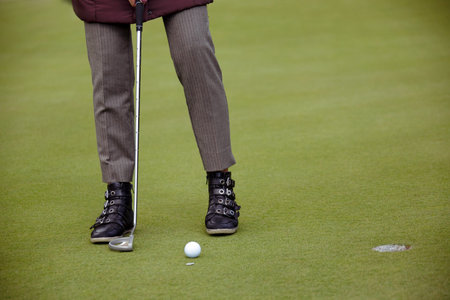 Person playing golf
