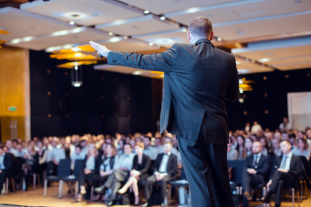 Speaker giving talk at business conference eventの写真素材
