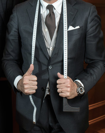 Tailor man in suitの写真素材