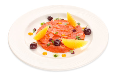 Molecular modern cuisine red fish in a dish with beautiful garnish close up. Isolatedの写真素材