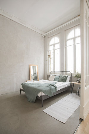 Interior bedroom of white and gray cozy bedの写真素材
