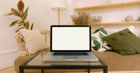 Copy space template - close up shot of modern laptop with chroma key green set up for work in living room at home - technology, design conceptの写真素材