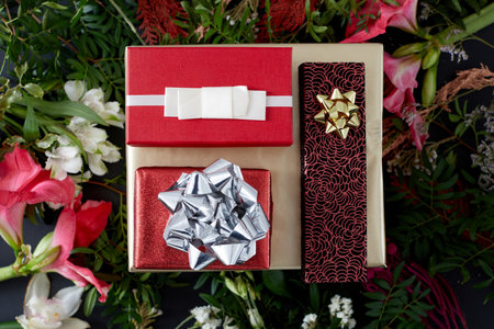 Set of red gift boxes and flowers