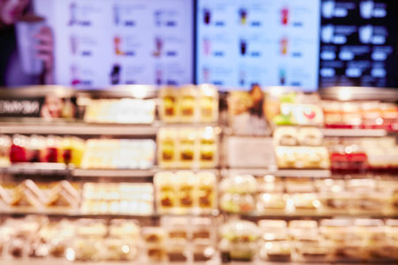 Blurry display counter with food and drink menuの写真素材