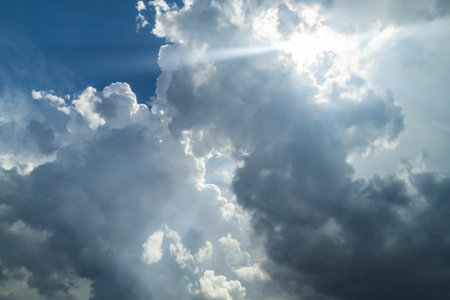 Photo of beams of the sun passing through clouds