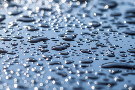 Photo of drops of water on a metal surfaceの写真素材