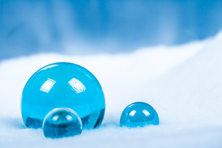 Ice spheres on snow (white fur)の写真素材